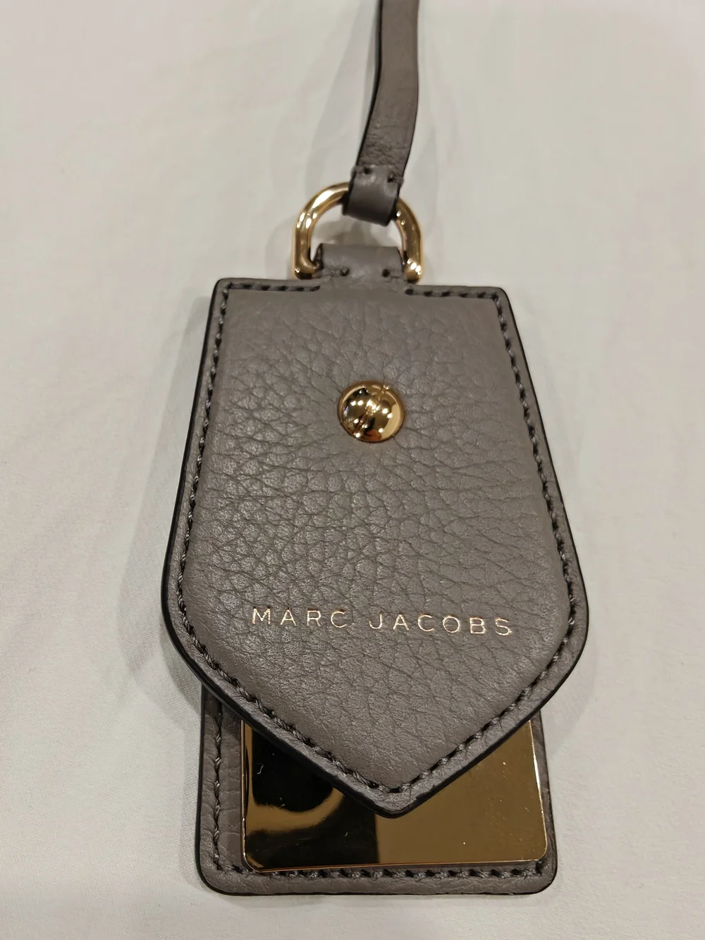 Marc Jacobs mink-grey textured leather luggage and bag tag